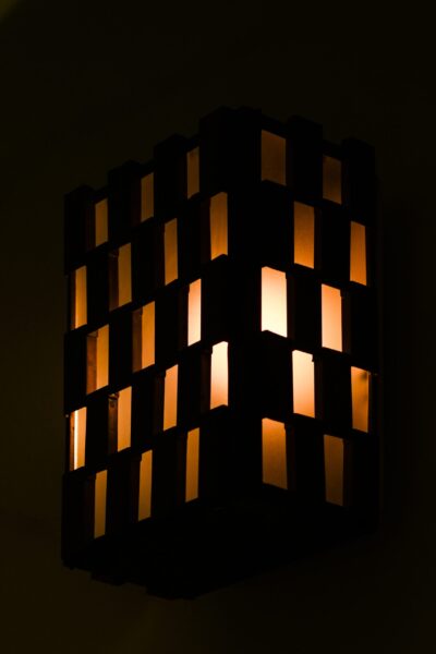 Wall lamp in copper and frosted glass at Studio Schalling