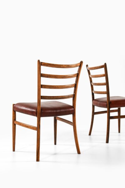 Dining chairs in rosewood and niger leather at Studio Schalling