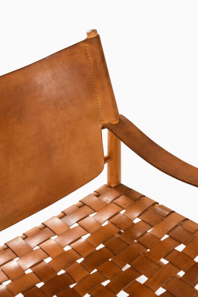 Easy chairs in beech and leather at Studio Schalling