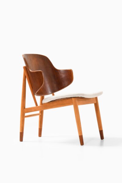 Ib Kofod-Larsen easy chair in beech and teak at Studio Schalling