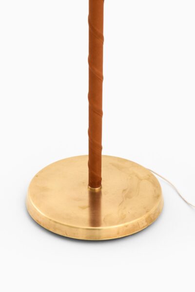 Floor lamps in brass and leather by ASEA at Studio Schalling