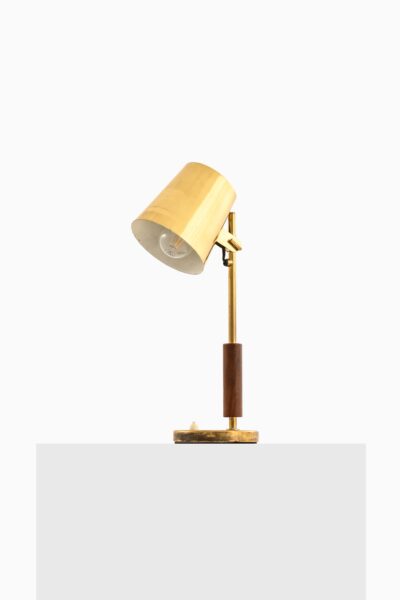 Paavo Tynell table lamp in brass and teak at Studio Schalling