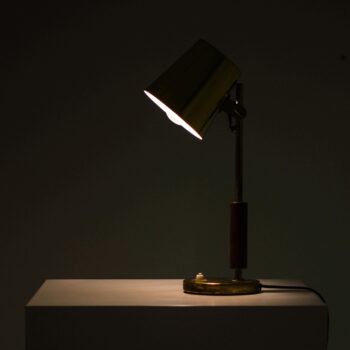 Paavo Tynell table lamp in brass and teak at Studio Schalling