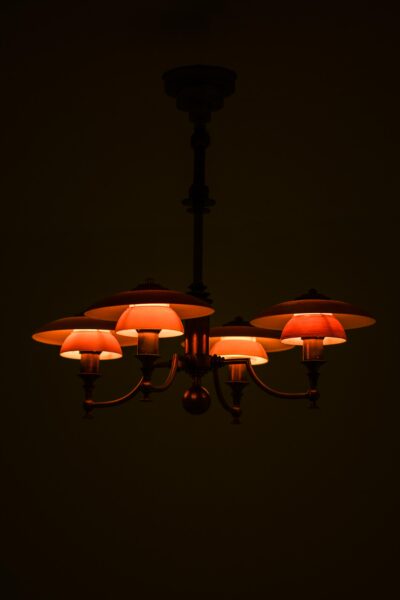 Ceiling lamp in browned brass and glass at Studio Schalling