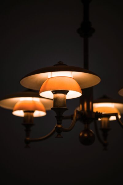 Ceiling lamp in browned brass and glass at Studio Schalling