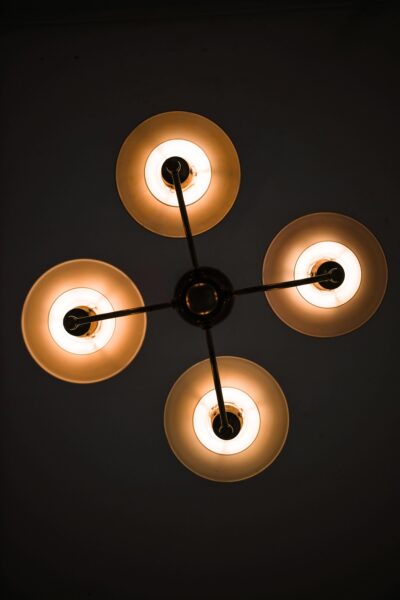 Ceiling lamp in browned brass and glass at Studio Schalling