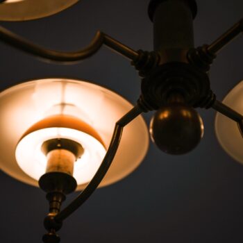 Ceiling lamp in browned brass and glass at Studio Schalling