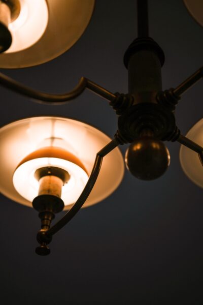 Ceiling lamp in browned brass and glass at Studio Schalling