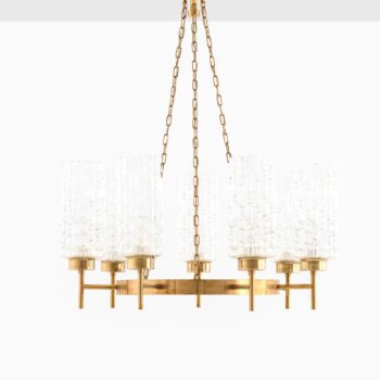 Pair of ceiling lamps in brass and glass at Studio Schalling