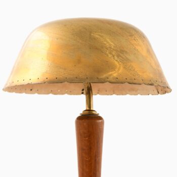 Table lamp in brass and beech at Studio Schalling
