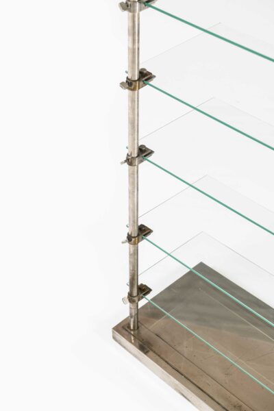 Shelf in glass and steel by A. Ravenel at Studio Schalling