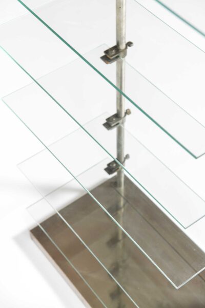 Shelf in glass and steel by A. Ravenel at Studio Schalling