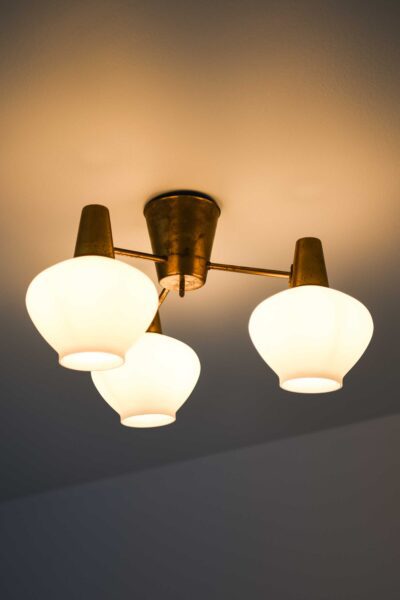 Hans Bergström ceiling lamps in brass at Studio Schalling