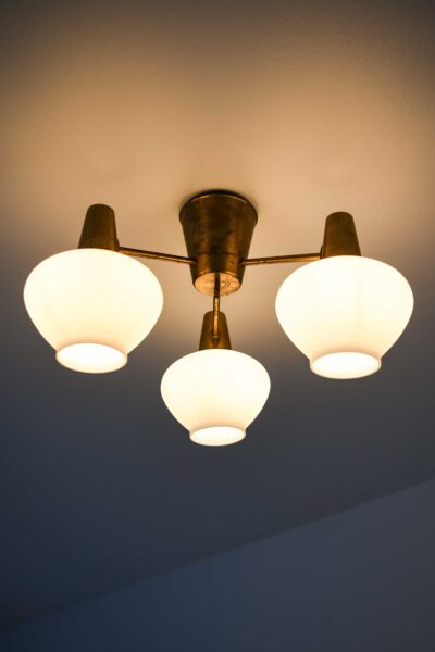 Hans Bergström ceiling lamps in brass at Studio Schalling