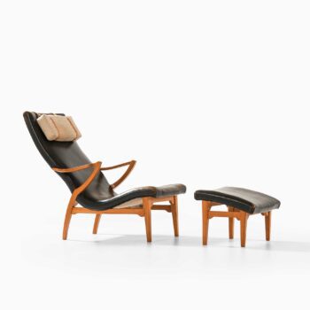 Easy chair in elm and black leather at Studio Schalling