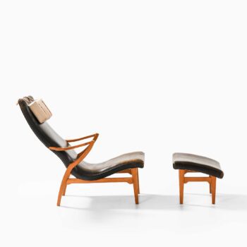 Easy chair in elm and black leather at Studio Schalling