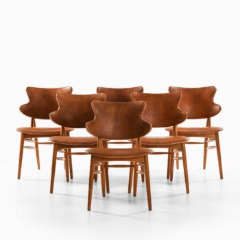 Ib Kofod-Larsen dining chairs in oak at Studio Schalling