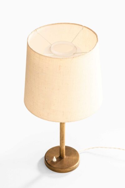 Table lamp in brass and opaline glass at Studio Schalling