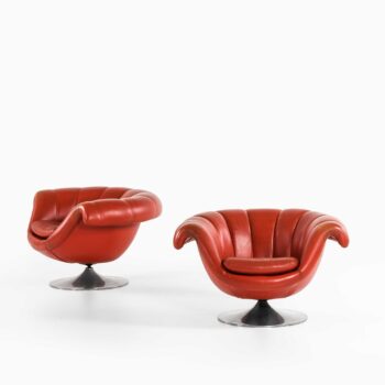 Easy chairs in aluminium and red leather at Studio Schalling
