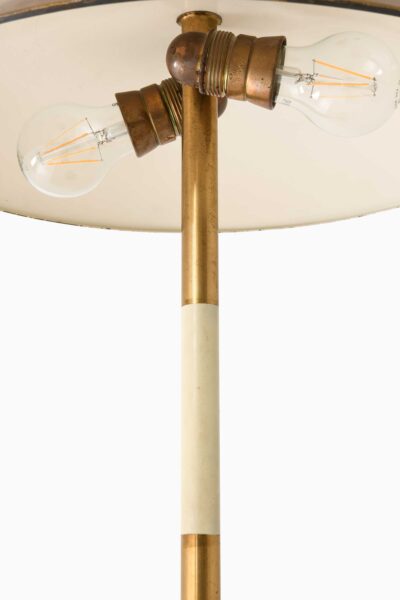 Table lamp in brass and white lacquered metal at Studio Schalling